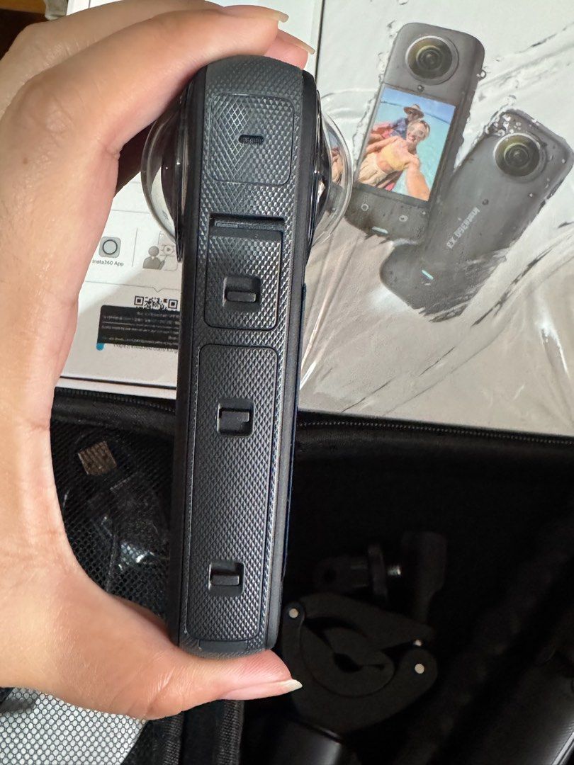 Insta360 X3 360 Action Cam with Accessories (Category: Cameras) located in Makati City. Submitted by yohanzen (Listing ID 1466515283, Image 2). Description: ✨✨ WITH SD CARD✨✨ Insta360 X3 360 action camera in black. Includes the original retail box, carrying case, two selfie sticks, a clamp mount, and a protective silicone case. Dual fisheye lenses, touchscreen interface, and side control buttons. Ready to shoot out of the box. 📱✨ GADGETS FOR SAL