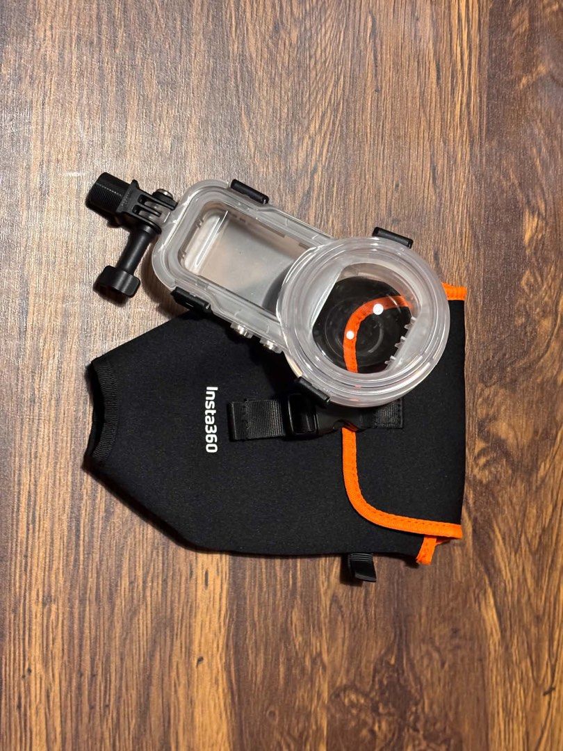 Insta360 X5 Dive Case and Floating Hand Grip (Category: Video Cameras) located in Pasig City. Submitted by maeciii (Listing ID 1466417022, Image 1). Description: - Complete Insta360 underwater filming set - Includes clear dive case, protective pouch, and buoyant orange-black hand grip - Foam grip prevents the camera from sinking - Standard mounts included on both items - Clean condition, ready for snorkeling and water sports.