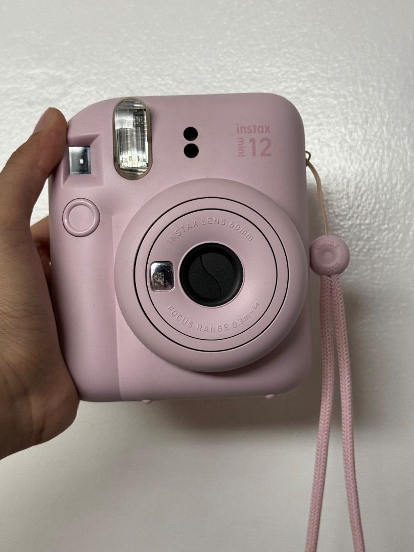 Instax Mini 12 (Category: Cameras) located in Manila. Submitted by jjeuwidonut (Listing ID 1466559146, Image 1). Description: unit only, new batt..