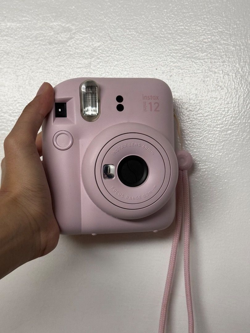 Instax Mini 12 (Category: Cameras) located in Manila. Submitted by jjeuwidonut (Listing ID 1466559146, Image 2). Description: unit only, new batt..