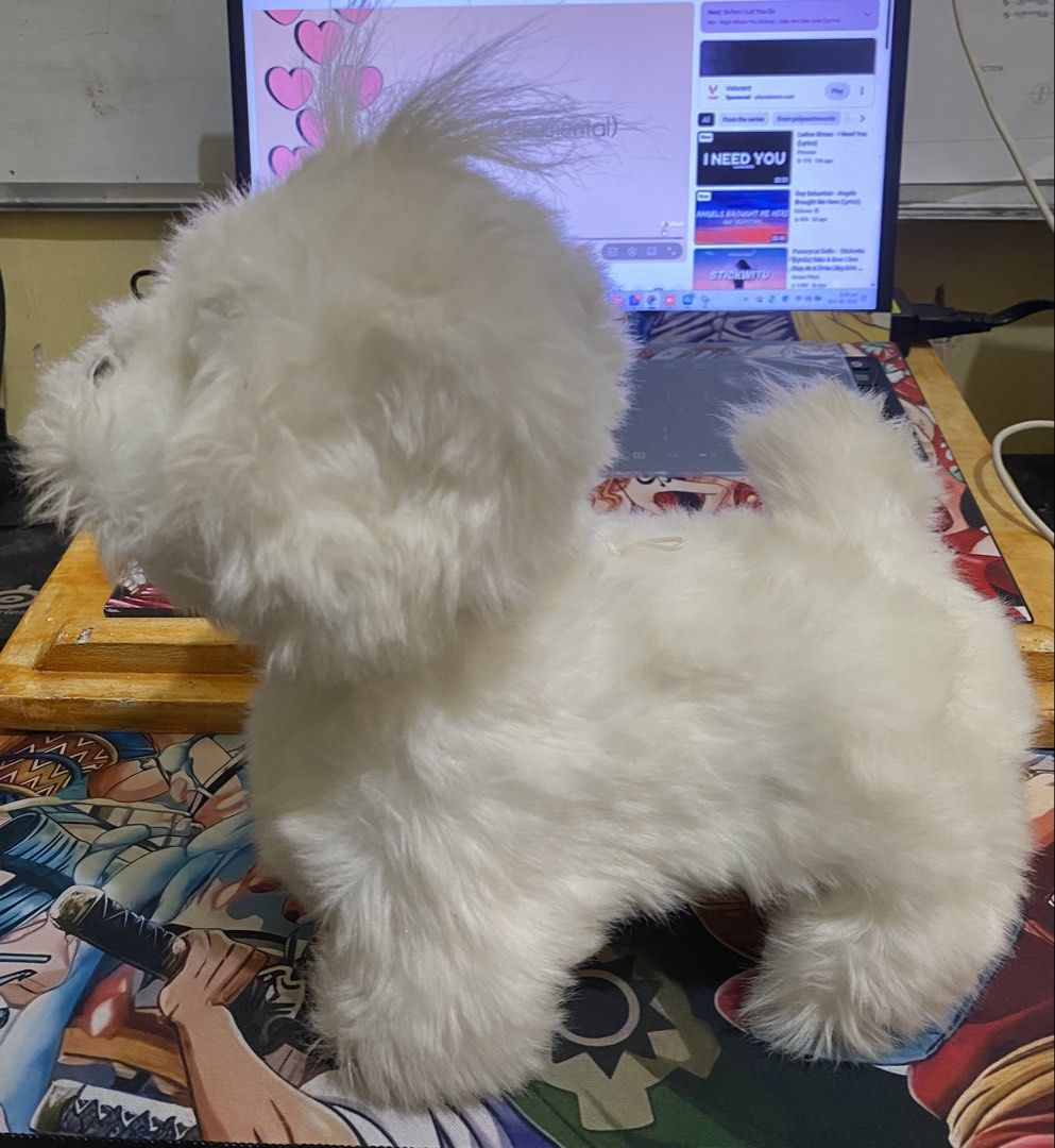 Interactive White Puppy Dog Electronic Plush Toy (Category: Plushies & Soft Toys) located in Baguio. Submitted by thrift_bonita (Listing ID 1466494346, Image 3). Description: - Adorable fluffy white toy puppy with a soft coat - Features a cute black button nose and a fluffy tail - Stands firmly on its own - Electronic functions powered by batteries (compartment underneath, date stamp 2022.09) - Clean, well-maintained condition -not tesdted if wor