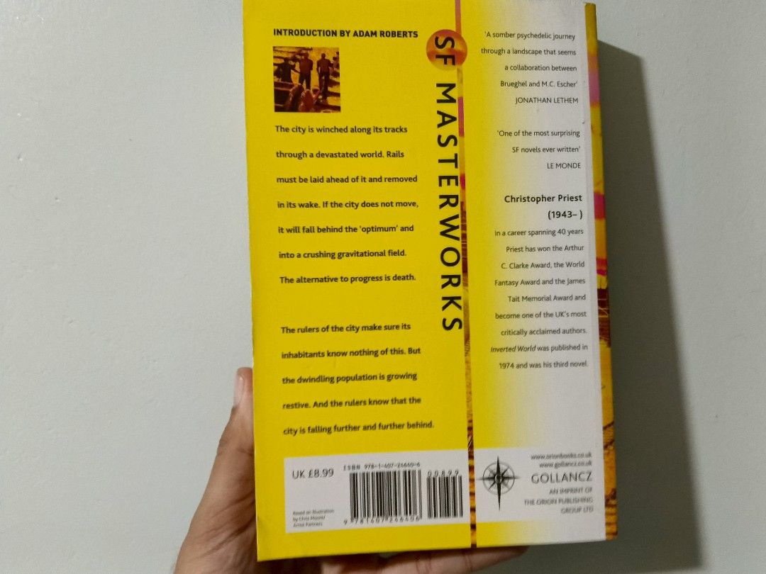 Inverted World by Christopher Priest SF Masterworks Paperback (Category: Storybooks) located in Tagum. Submitted by ria.bantayan (Listing ID 1466438810, Image 2). Description: - Title: Inverted World by Christopher Priest - Edition: SF Masterworks (Gollancz) - Cover Art: Iconic yellow design by Chris Moore - Format: Standard paperback - Condition: Readable copy, great for sci-fi fans - Genre: Classic science fiction (moving city on tracks).