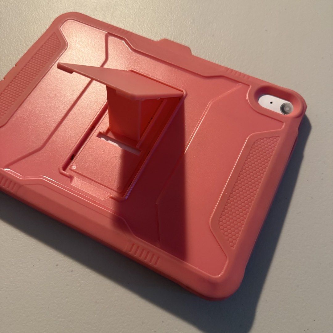 iPad (10th generation) case (Category: Cases & Sleeves) located in Manila. Submitted by cheemkenn (Listing ID 1466408656, Image 2). Description: - Compatible model: iPad (10th Generation) - Color: Pink - Heavy-duty rugged design for maximum drop and scratch protection - Built-in adjustable kickstand for convenient hands-free viewing - Precise cutouts for buttons, speakers, and camera - Meetup preference: De La Salle University (Taft Ave), 4 PM on