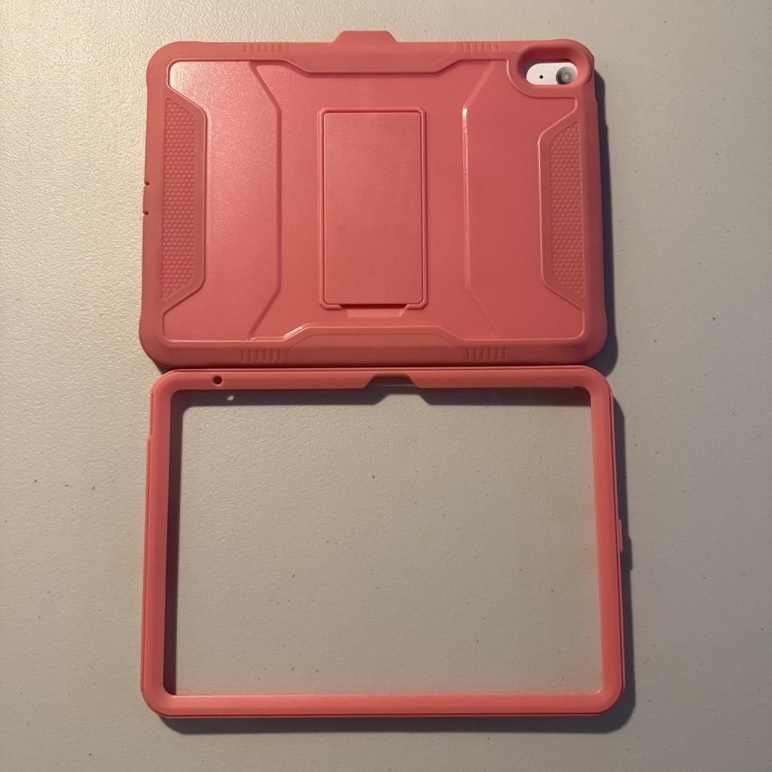 iPad (10th generation) case (Category: Cases & Sleeves) located in Manila. Submitted by cheemkenn (Listing ID 1466408656, Image 1). Description: - Compatible model: iPad (10th Generation) - Color: Pink - Heavy-duty rugged design for maximum drop and scratch protection - Built-in adjustable kickstand for convenient hands-free viewing - Precise cutouts for buttons, speakers, and camera - Meetup preference: De La Salle University (Taft Ave), 4 PM on