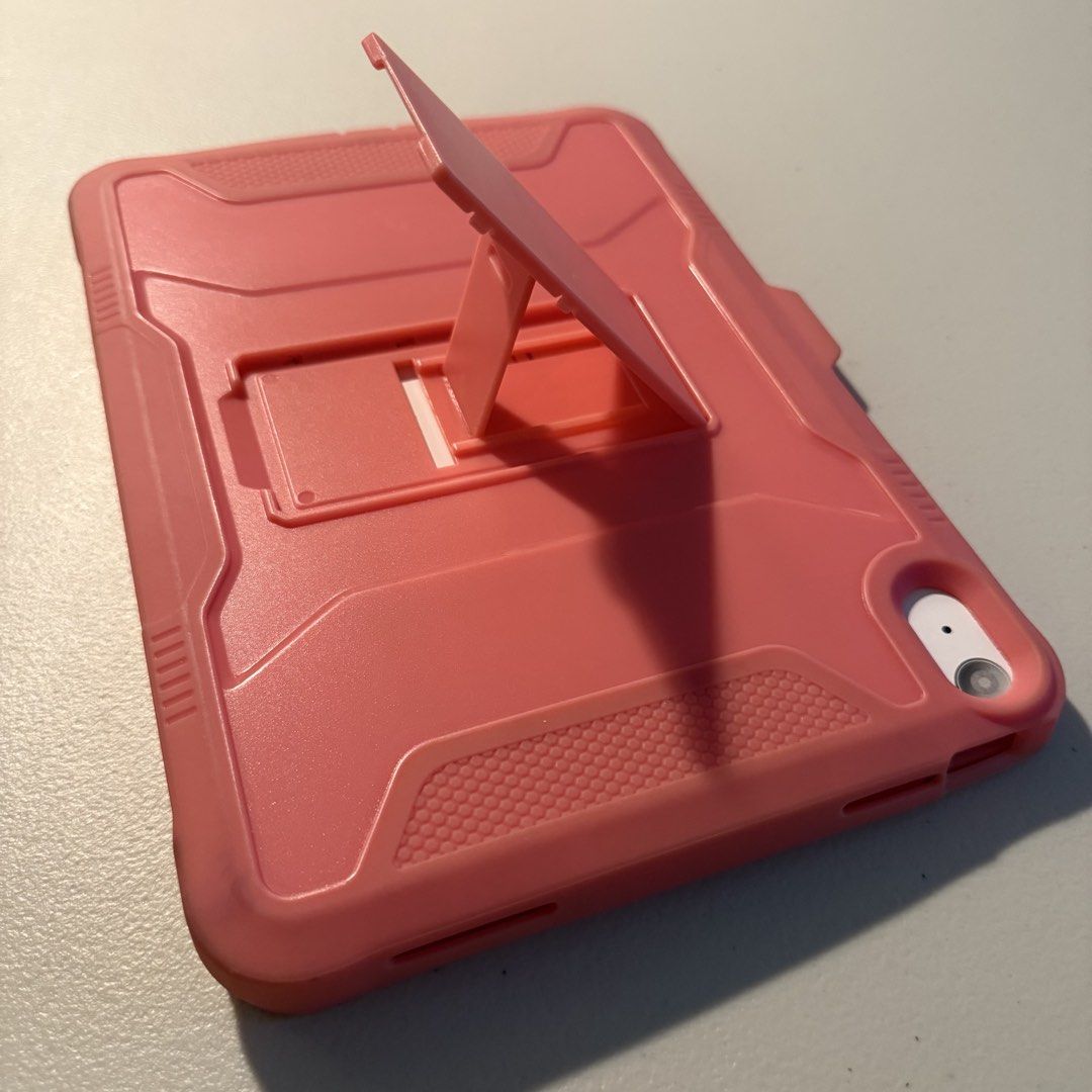 iPad (10th generation) case (Category: Cases & Sleeves) located in Manila. Submitted by cheemkenn (Listing ID 1466408656, Image 3). Description: - Compatible model: iPad (10th Generation) - Color: Pink - Heavy-duty rugged design for maximum drop and scratch protection - Built-in adjustable kickstand for convenient hands-free viewing - Precise cutouts for buttons, speakers, and camera - Meetup preference: De La Salle University (Taft Ave), 4 PM on