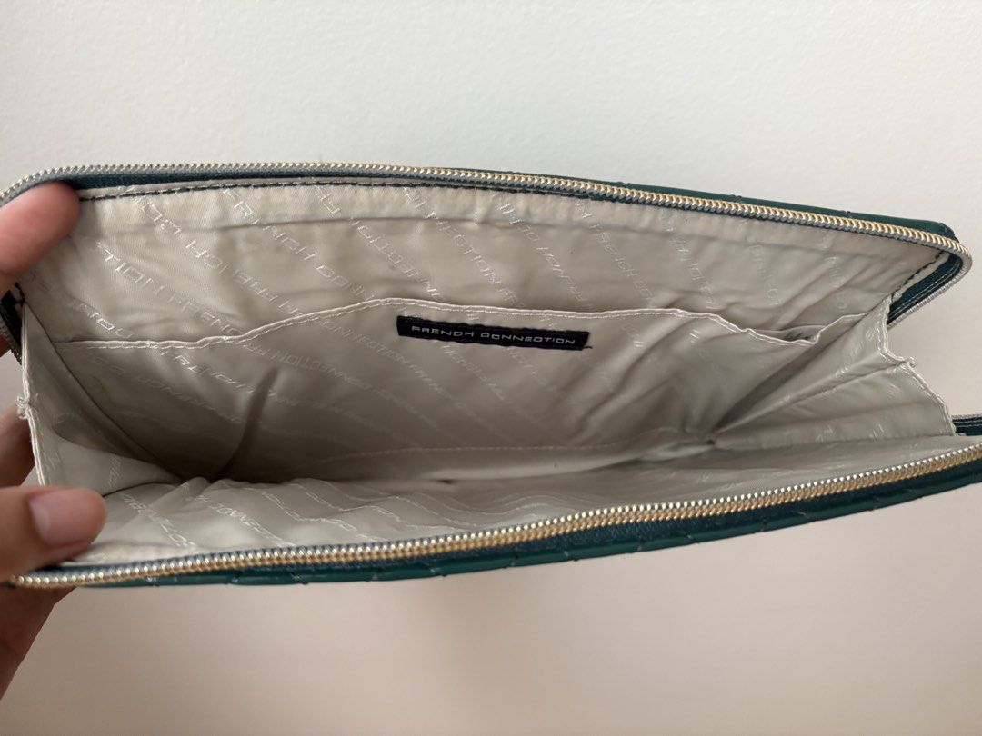 IPAD case (Category: Laptop Bags & Sleeves) located in Manila. Submitted by cassyandco. (Listing ID 1466342834, Image 2). Description: - Brand: French Connection - Color: Dark green with a trendy patent glossy finish - Exterior: Quilted design with metal logo plate .