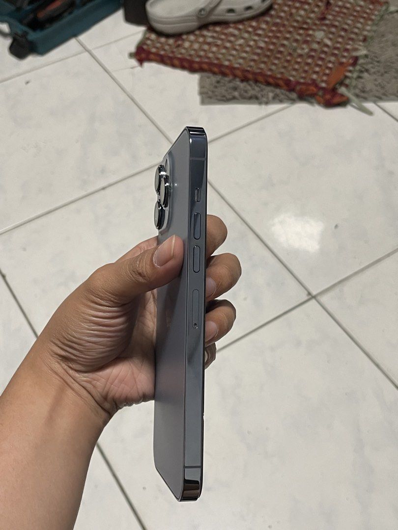 Iphone 13 Pro Max (Category: iPhone 13 Series) located in Pasig City. Submitted by pawielliinnee (Listing ID 1466013148, Image 3). Description: Details(kindly read all details po!!) •Iphone 13 Pro Max •Color: Blue •Storage: 128GB •Battery Health: 96%(replaced/verified, used battery)Feb 1,2026 •True tone✅ •Face id✅ •No sim restriction •Unli reset •All working •Strictly no return once settled! Inclusions: •Case •Unit Issue: All posted(see pics atta