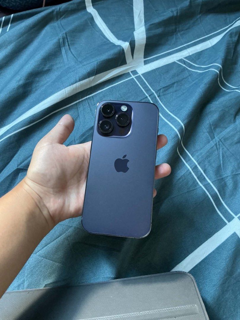 IPHONE 14 128GB (Category: iPhone 14 Series) located in Manila. Submitted by clayyyyy777 (Listing ID 1466493866, Image 2). Description: IPHONE 14 PRO DEEP PURPLE 128GB 69% BATT HEALTH WITH CHARGER AND CASES NO BOX NEGOTIABLE SA SURE BUYER PERO WAG NAMAN MASYADO BARATIN.