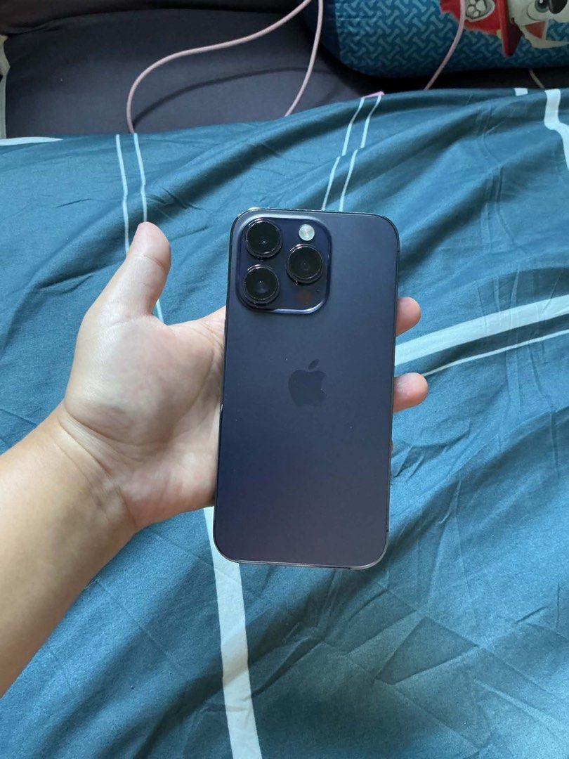 IPHONE 14 128GB (Category: iPhone 14 Series) located in Manila. Submitted by clayyyyy777 (Listing ID 1466493866, Image 1). Description: IPHONE 14 PRO DEEP PURPLE 128GB 69% BATT HEALTH WITH CHARGER AND CASES NO BOX NEGOTIABLE SA SURE BUYER PERO WAG NAMAN MASYADO BARATIN.