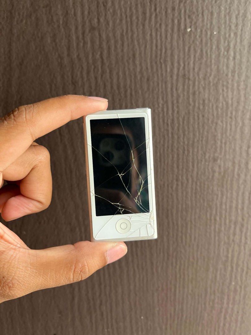 Ipod nano 7th gen (Category: Portable Music Players) located in Quezon City. Submitted by all_about_retro (Listing ID 1466463731, Image 2). Description: Ipod nano 7th gen 16gb Good buttons Good lcd malinis pa, basag lang touchscreen pero na ttouch pa ren Minsan nag ddisplay minsan haggang apple logo lang Issue: dead battery, basag touchscreen Good for parts or repair Pickup.