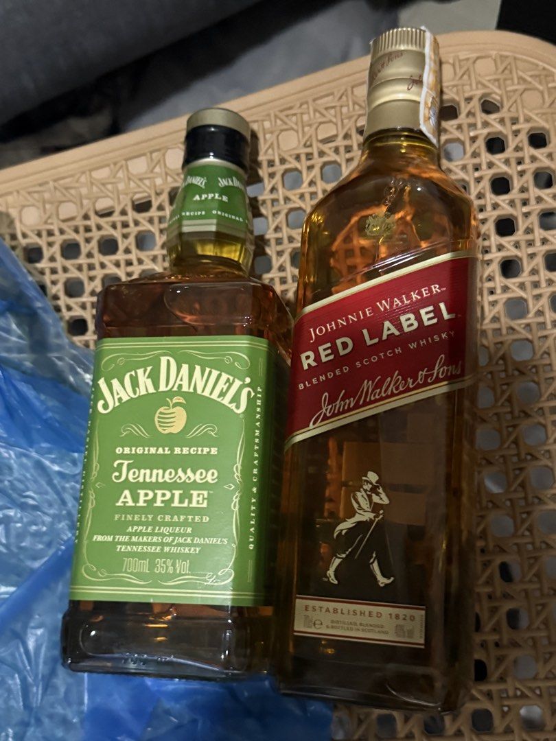 Jack Daniel's Tennessee Apple and Johnnie Walker Red Label (Category: Beverages) located in Manila. Submitted by karl.1995 (Listing ID 1466497334, Image 1). Description: - 2 popular bottled spirits for sale - Jack Daniel's Tennessee Apple Liqueur (700ml, 35% ABV) - Johnnie Walker Red Label Blended Scotch Whisky (700ml) - Both bottles are 100% unopened and sealed tightly - Great addition to your home bar or weekend gatherings - Selling as a set fo