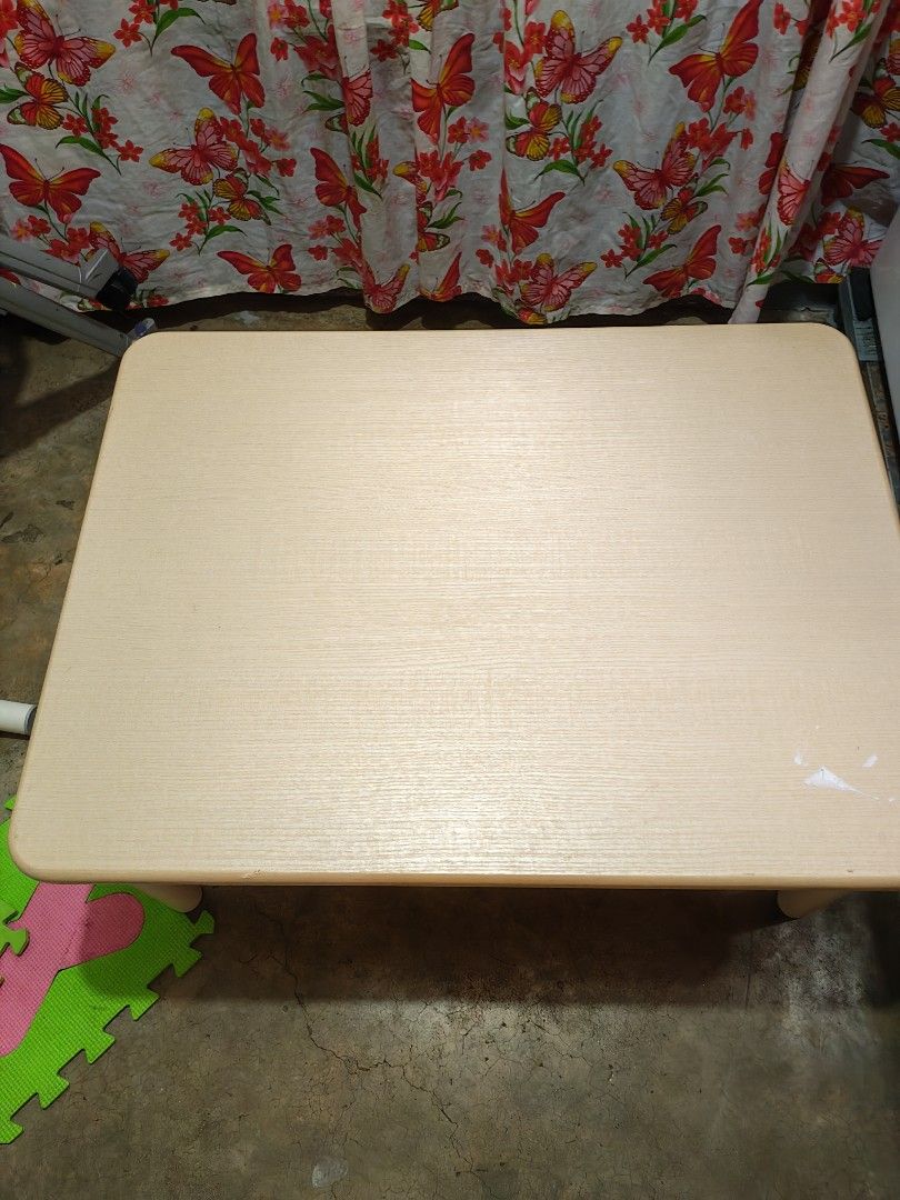 Japan surplus lowtable (Category: Tables & Sets) located in Manila. Submitted by aks_japansurplus30 (Listing ID 1466519012, Image 2). Description: - Design: Wooden finish top with smooth curved corners and sturdy white screw-on legs - Size & Use: Perfect size for kids or casual low floor seating setups - Condition: Minor scuffs on the surface and some sticker residue on one leg - Assembly: Easy to assemble with legs that screw on effortlessly 2pc