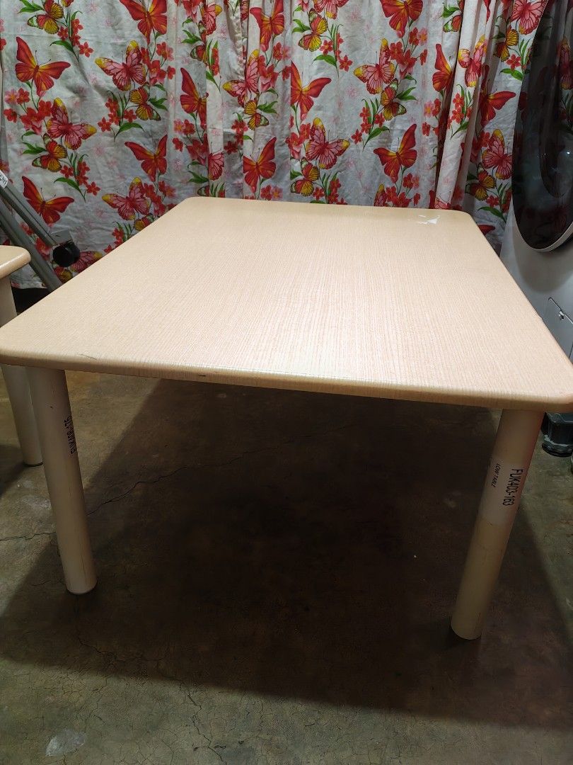 Japan surplus lowtable (Category: Tables & Sets) located in Manila. Submitted by aks_japansurplus30 (Listing ID 1466519012, Image 3). Description: - Design: Wooden finish top with smooth curved corners and sturdy white screw-on legs - Size & Use: Perfect size for kids or casual low floor seating setups - Condition: Minor scuffs on the surface and some sticker residue on one leg - Assembly: Easy to assemble with legs that screw on effortlessly 2pc