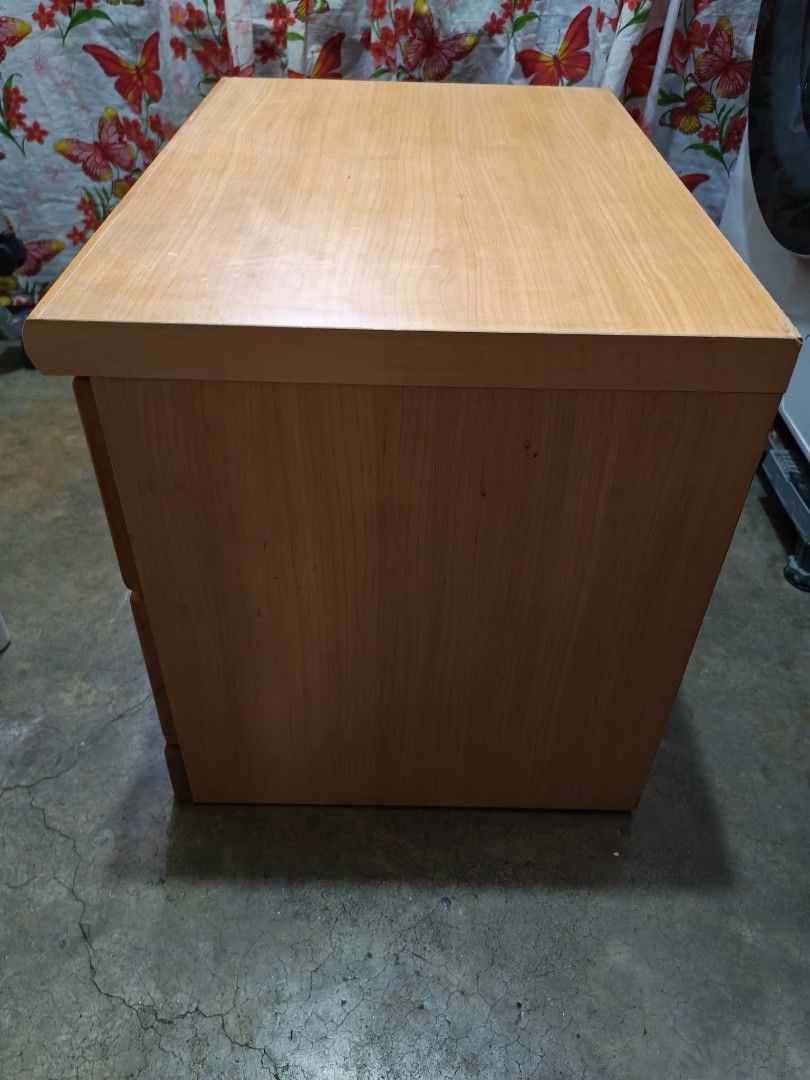 Japan surplus Side cabinet (Category: Shelves, Cabinets & Racks) located in Manila. Submitted by aks_japansurplus30 (Listing ID 1466518595, Image 3). Description: - Solid wooden drawer unit in a stylish light brown finish - Features 3 spacious pull-out drawers with built-in handles and clean interiors - Sturdy and compact design, perfect for small spaces and organizing bedroom items - Note: Has minor scuff marks and wear on the front left drawer 