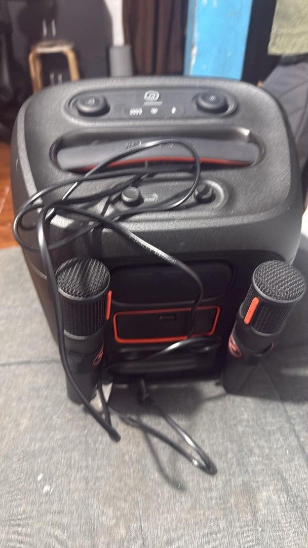 JBL PartyBox Encore Essential Portable Bluetooth Speaker with Microphones (Category: Soundbars, Speakers & Amplifiers) located in Rizal. Submitted by janeyca07 (Listing ID 1466368917, Image 2). Description: - Authentic JBL PartyBox portable speaker in sleek black - Powerful sound output with a vibrant built-in light ring on the front grille - Includes two wireless microphones that store securely in slots on the back panel - Convenient top control