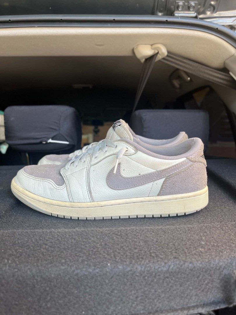 Jordan 1 Retro Low OG Atmosphere Grey (Category: Sneakers) located in Manila. Submitted by maudmd (Listing ID 1466452857, Image 2). Description: - Model: Nike Air Jordan 1 Low - Colorway: Atmosphere Grey - Size: US 9.5 - Materials: White leather base with suede overlays on toe and heel - Condition: Worn with visible dirt on uppers and soles - Durability: Soles still have plenty of life and tread left - Style: Classic daily rotation sneakers ready