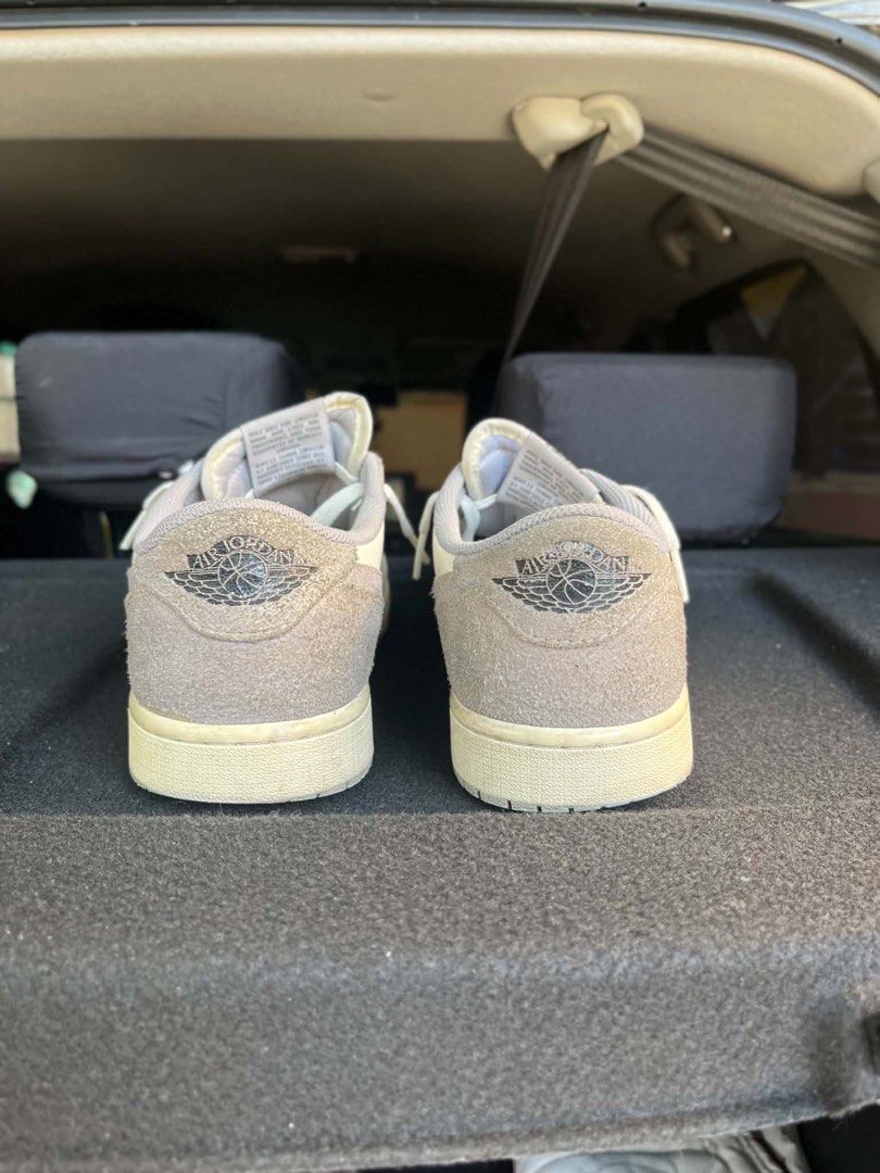 Jordan 1 Retro Low OG Atmosphere Grey (Category: Sneakers) located in Manila. Submitted by maudmd (Listing ID 1466452857, Image 3). Description: - Model: Nike Air Jordan 1 Low - Colorway: Atmosphere Grey - Size: US 9.5 - Materials: White leather base with suede overlays on toe and heel - Condition: Worn with visible dirt on uppers and soles - Durability: Soles still have plenty of life and tread left - Style: Classic daily rotation sneakers ready