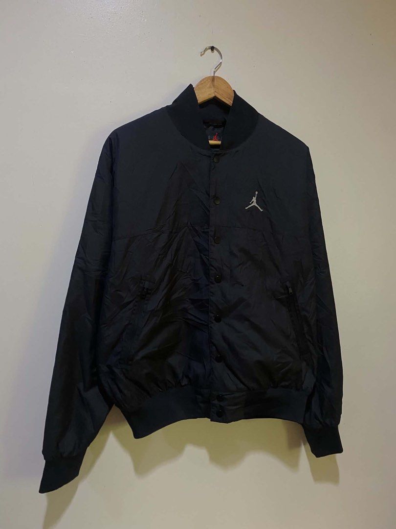 Jordan Black Bomber Jacket (Category: Coats, Jackets and Outerwear) located in Manila. Submitted by stmngo (Listing ID 1466554830, Image 1). Description: Size XL on tag Width 24 inches Length 27 inches Issue minimal pinholes pero hindi tagos (See last photos) Good Condition.