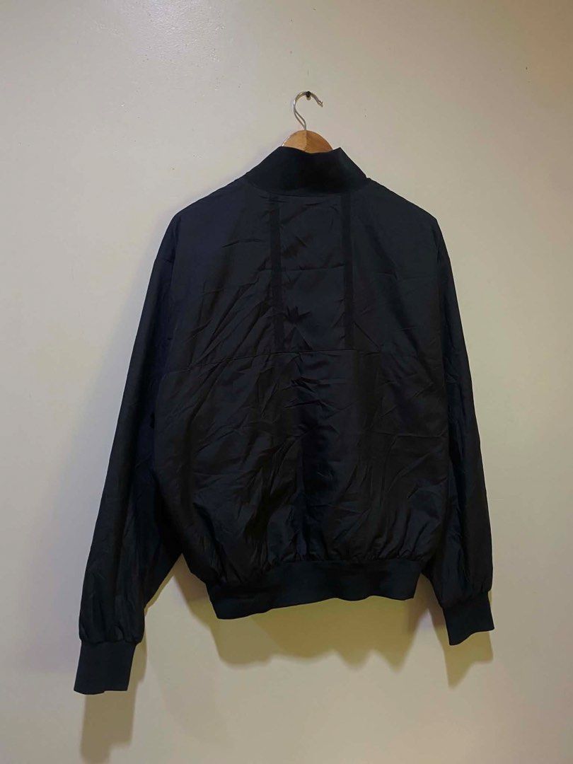 Jordan Black Bomber Jacket (Category: Coats, Jackets and Outerwear) located in Manila. Submitted by stmngo (Listing ID 1466554830, Image 2). Description: Size XL on tag Width 24 inches Length 27 inches Issue minimal pinholes pero hindi tagos (See last photos) Good Condition.
