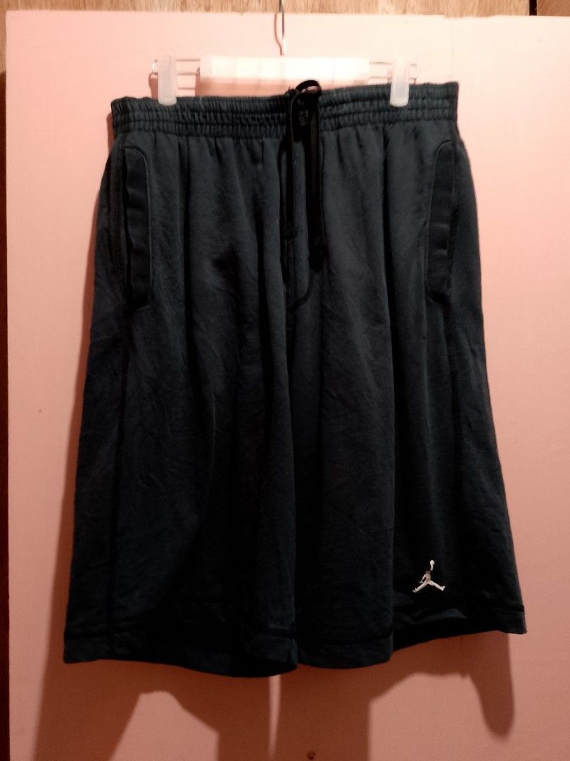 Jordan Black Shorts Size XL (Category: Shorts) located in General Trias. Submitted by elmerafelix-42143 (Listing ID 1466353310, Image 2). Description: - Brand: Jordan - Color: Solid Black - Size: XL - Condition: Clean, excellent overall - With pinhole - 9.2/10 Rate - Features: Elastic waistband with adjustable drawstring, two side pockets - Branding: Small embroidered white Jumpman logo on the left hem - Origin: Made in China - Material: Soft, br