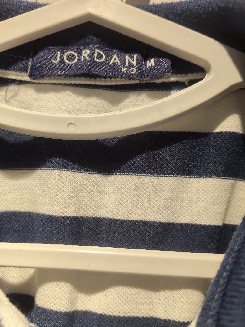Jordan Kid Boys Polo Shirt M (Category: Babies & Kids Fashion) located in Pasig City. Submitted by furmom06 (Listing ID 1466352946, Image 2). Description: W - 17" L- 20" Navy Blue and White Stripes.
