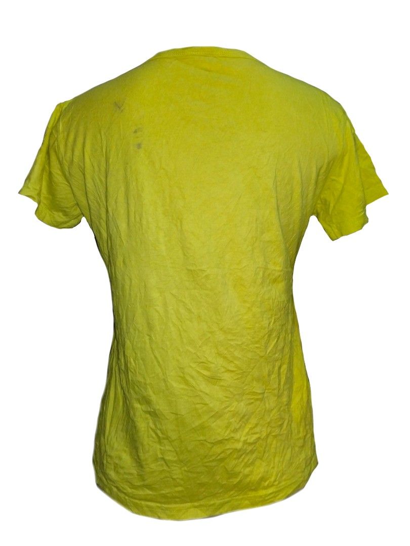 Julius & Friends Yellow Monkey T-Shirt (Category: Tshirts & Polo Shirts ) located in Manila. Submitted by thriftythreads1903 (Listing ID 1466516724, Image 2). Description: Bright yellow tee from Julius & Friends. Big monkey graphic on the front inside a pink circle. Short sleeves and crew neck design. Made in El Salvador. Noticeable stains on the upper back area from past wear..