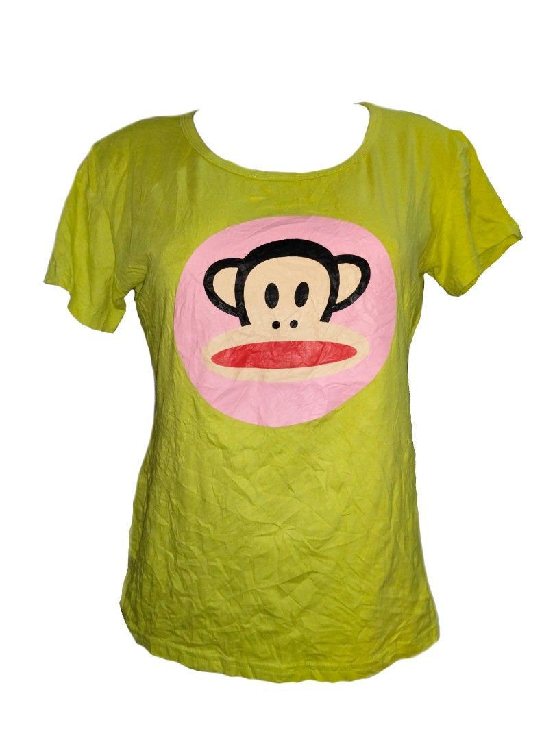 Julius & Friends Yellow Monkey T-Shirt (Category: Tshirts & Polo Shirts ) located in Manila. Submitted by thriftythreads1903 (Listing ID 1466516724, Image 1). Description: Bright yellow tee from Julius & Friends. Big monkey graphic on the front inside a pink circle. Short sleeves and crew neck design. Made in El Salvador. Noticeable stains on the upper back area from past wear..
