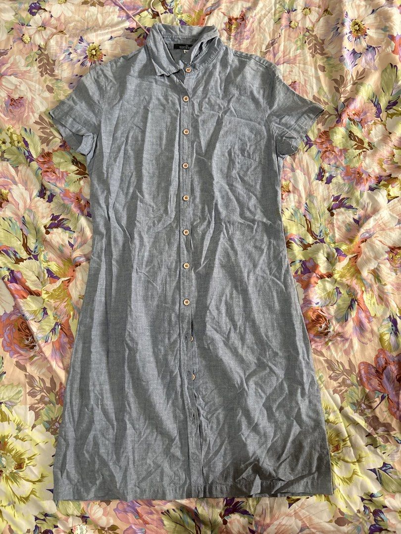Kamiseta grey button-down shirt dress medium (Category: Dresses) located in Paranaque City. Submitted by delikaite (Listing ID 1466416432, Image 1). Description: - Brand: Kamiseta - Color: Grey - Size: Medium - Style: Shirt dress with short sleeves, classic collar, and front button closure - Fit: Standard fit through the body - Material: Lightweight and breathable - Condition: Great for running errands or casual outings.