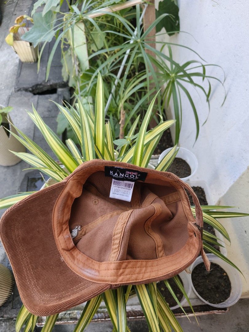 Kangol Corduroy Baseball Cap Choco Brown (Category: Caps & Hats) located in Binan City. Submitted by makinpeso0622 (Listing ID 1466372225, Image 3). Description: - Brand: Kangol - Style: Corduroy baseball cap (unstructured) - Color: Rich brown - Details: Embroidered kangaroo logo on front, adjustable strap with branded metal clasp - Condition: Minor wear on the inner sweatband from previous use, otherwise in great shape - Super comfortable and ve
