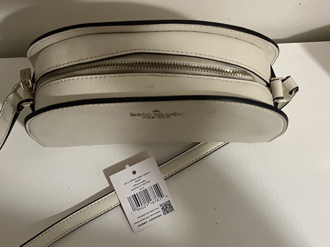 Kate Spade Perry Dome (Category: Cross-body Bags) located in Manila. Submitted by irish_closet (Listing ID 1466481512, Image 3). Description: - Saffiano leather - Bought in Japan, Authentic Item w/ tag - No issues .