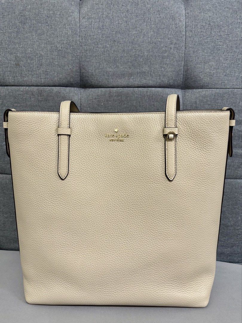 Kate Spade Tote Bag (Category: Tote Bags) located in Angeles City. Submitted by my_little_one_ph (Listing ID 1466448107, Image 1). Description: Authentic Lightly used Beige color.