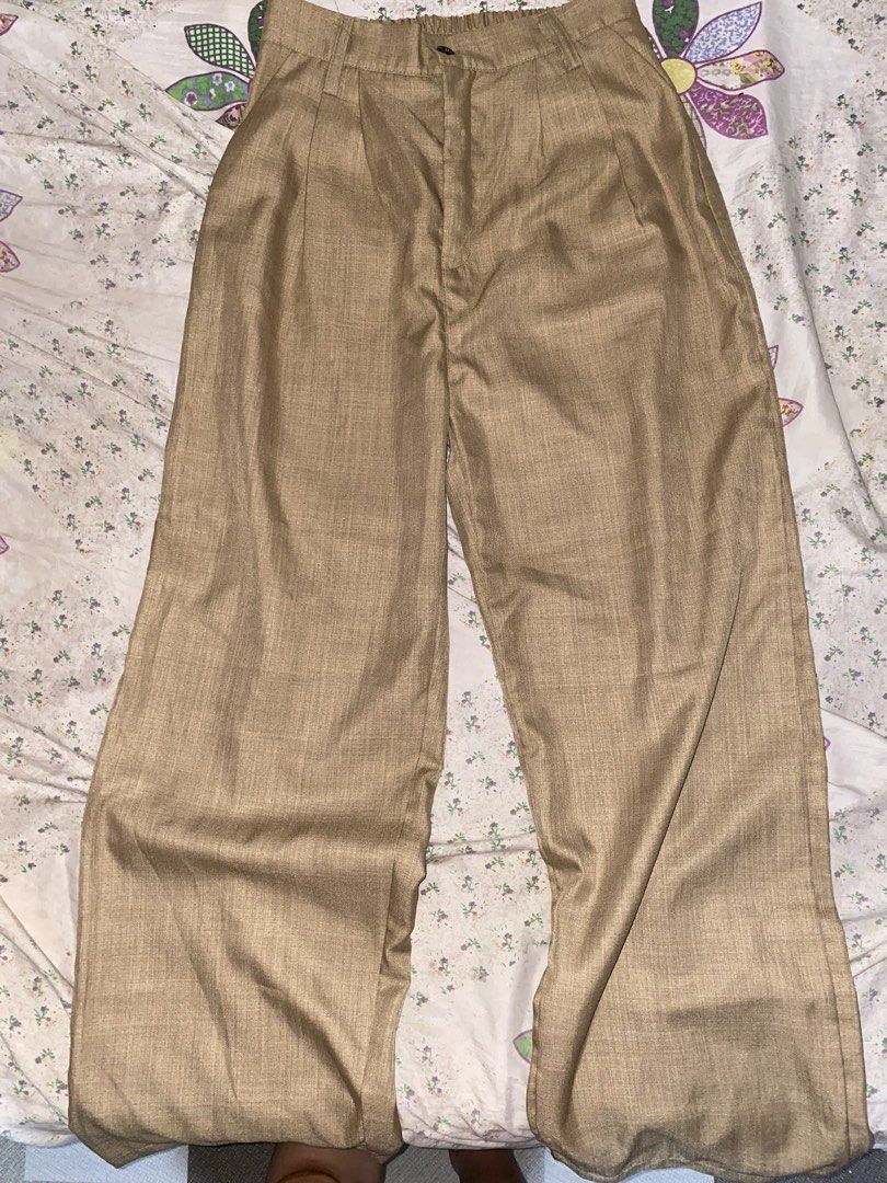 Khaki Baggy Trouser (Category: Other Bottoms) located in Manila. Submitted by naheulclothes (Listing ID 1466415723, Image 1). Description: • can lower up to ₱200 • used once lang, no issue • garterized waist 23-27 • j&t and lalamove mod • mop : gotyme, gcash, maribank • location : Taytay, Rizal.