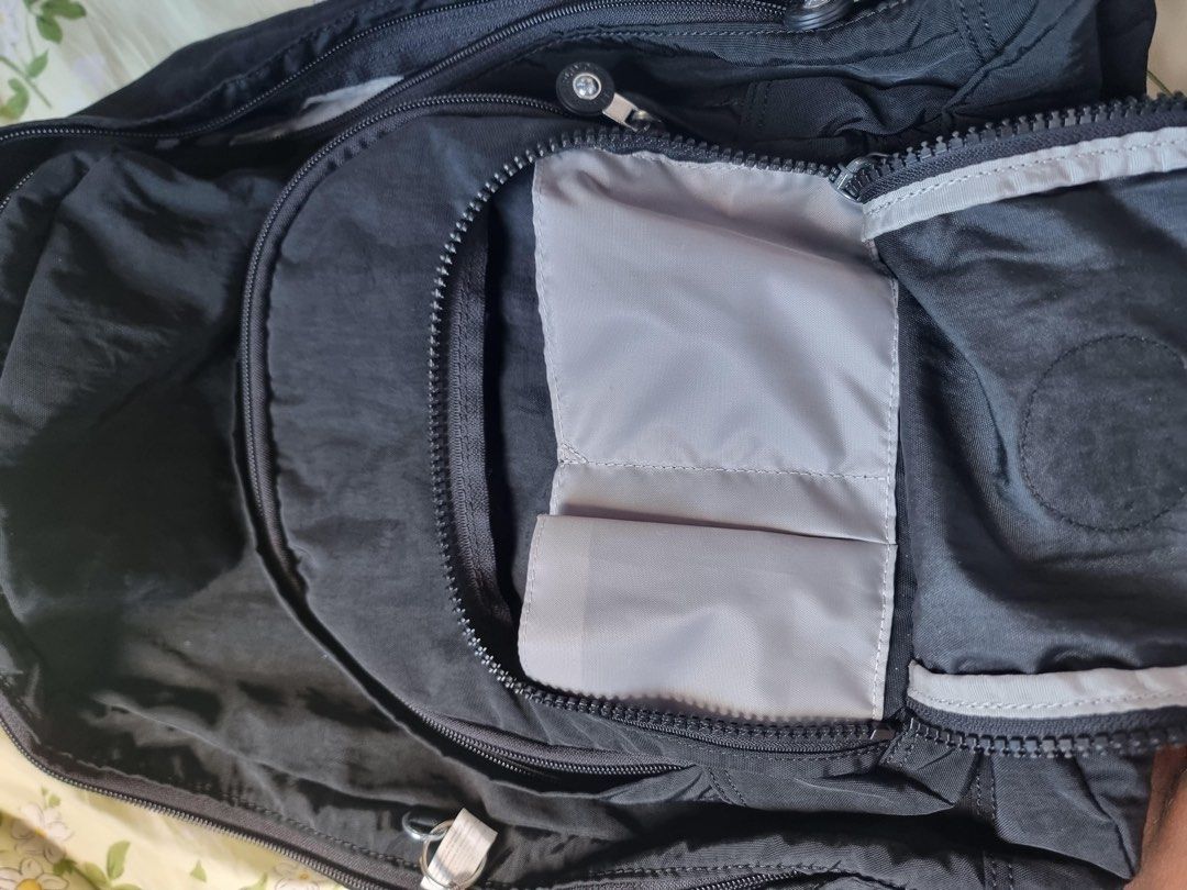 Kipling Harper Bag !! (Category: Backpacks) located in Manila. Submitted by jamiesicosana512 (Listing ID 1466528797, Image 2). Description: My boyfriend’s bag actually, he asked me to sell it here, it’s from his Aunt from Canada. He got it last day from the post office. Original but he doesn’t like the design cuz it’s too feminine for him. 100% original :) Imported, never been used. It has monkey keychain !! U can check the authenticity :) Rfs: M