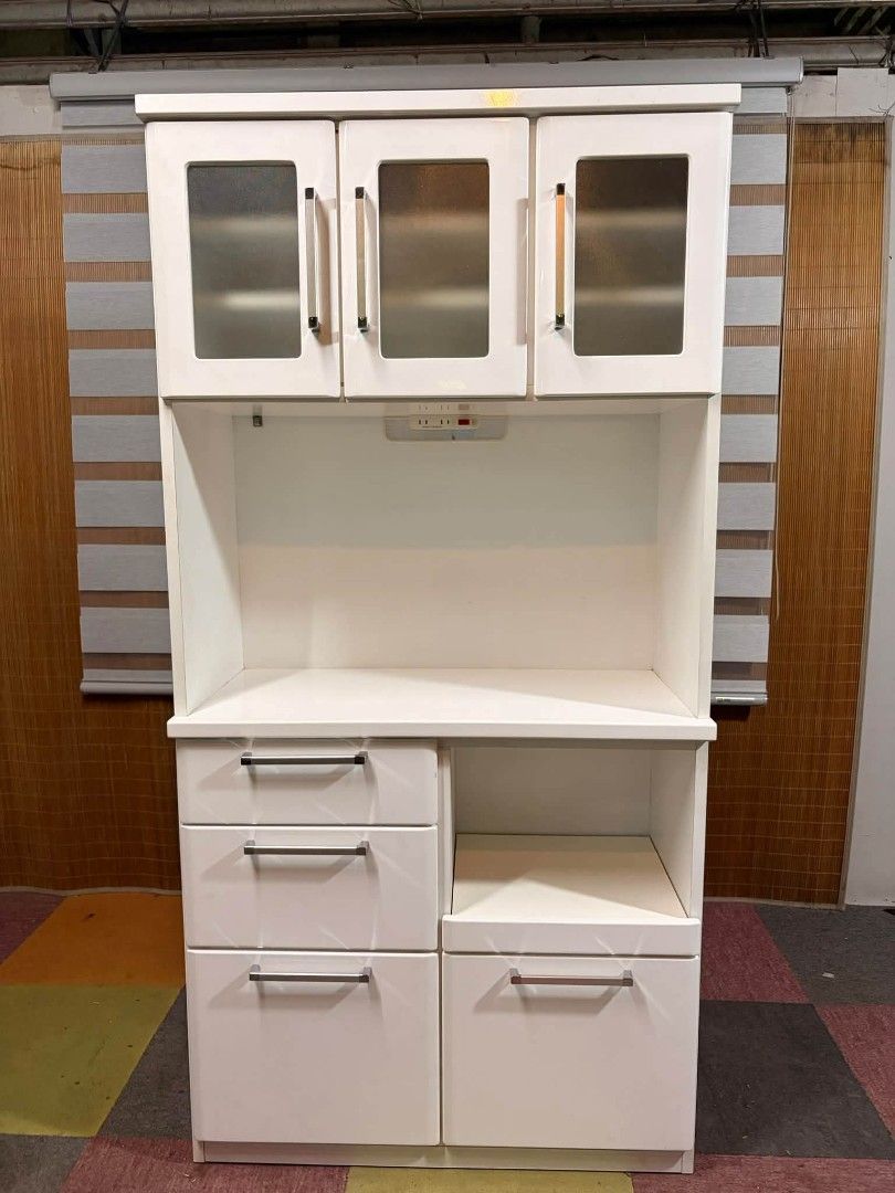 Kitchen Cabinet (Category: Shelves, Cabinets & Racks) located in Meycauayan. Submitted by marygracecasimiro (Listing ID 1466390561, Image 1). Description: NITORI Dahlia 100KB Kitchen Organizer Cabinet DUCO FINISH!!! Glass Upper Cabinets Adjustable Shelves, Power Extension Outlets 220V Pullout Shelf for Rice Cooker Medium to Large Storage Drawers Price : 10,500 ✅ 36L x 17W x 71H inches In VERY good condition 💚 Sale:8500🩷.