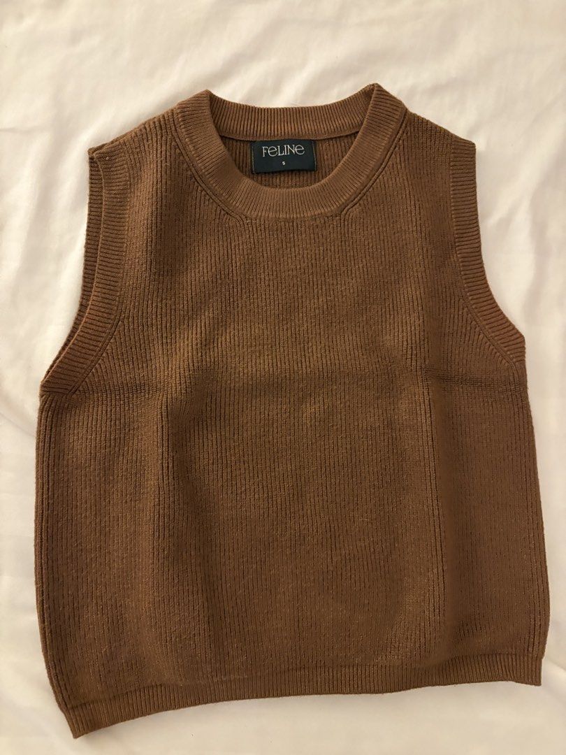 Knitted Crop Top (Category: Sleeveless) located in Baguio. Submitted by outfromcloset (Listing ID 1466529132, Image 1). Description: Thick fabric - one of my favorites .