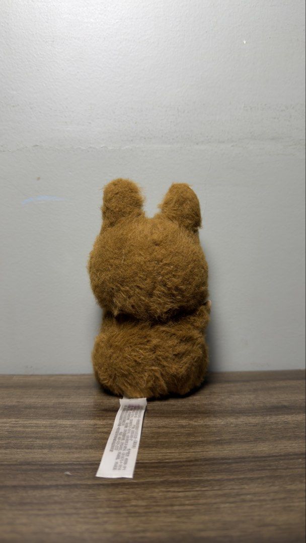 Labubu “Have a seat” Secret - DuoDuo (Category: Plushies & Soft Toys) located in Baguio. Submitted by fndrskprskid (Listing ID 1466484219, Image 2). Description: - Authentic Pop Mart Brown Labubu plush figure in pristine, clean condition - Features iconic pointy ears, wide mischievous grin with tiny teeth, big brown eyes, and rosy cheeks - Detailed with small plastic hands and feet (official Pop Mart branding on the right foot) - Complete with lo