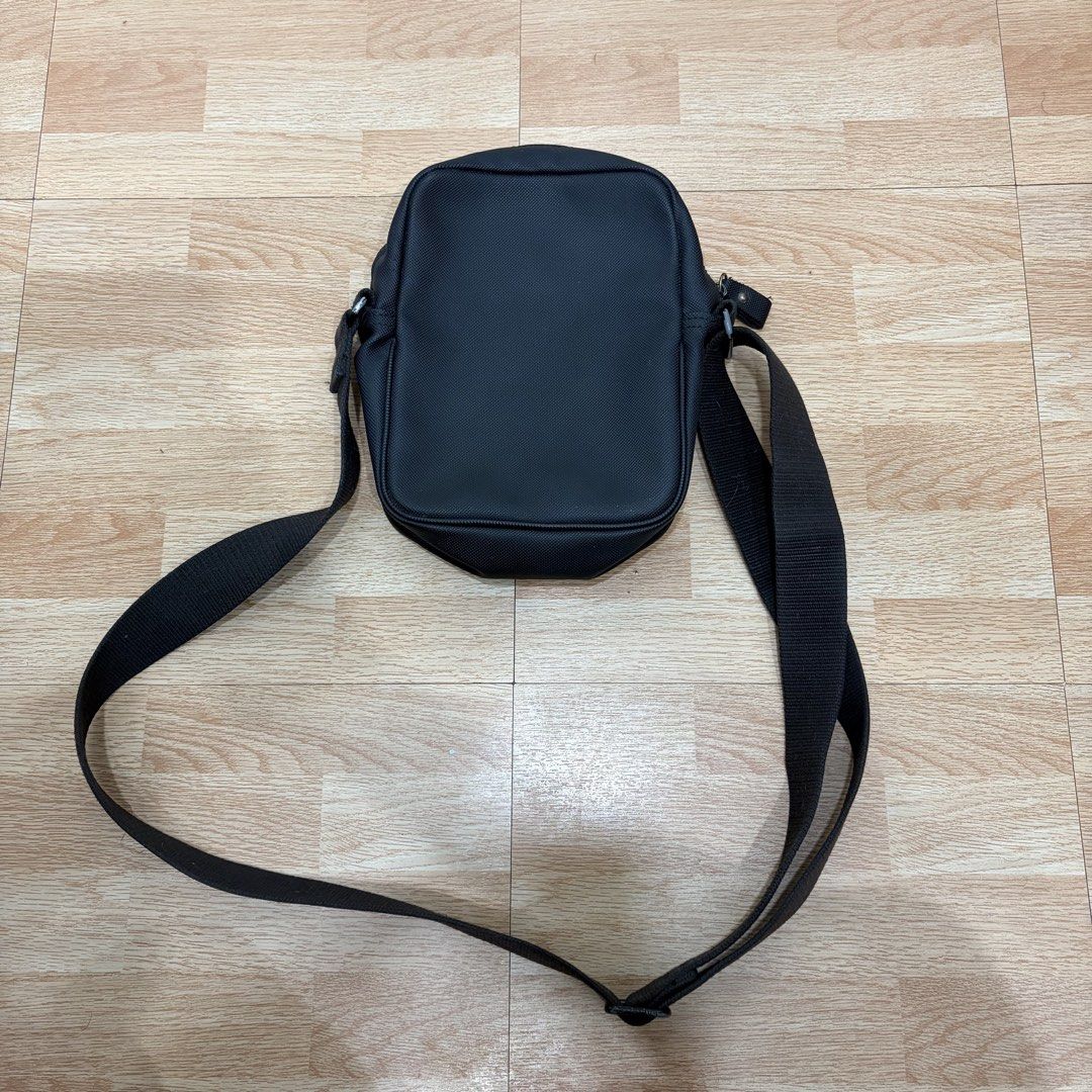 Lacoste (Category: Sling Bags) located in Santa Rosa. Submitted by gardenofthrifts (Listing ID 1466560678, Image 3). Description: Bag ₱1580 Width: 7.5 Height: 9.5 10/10 Condition Comment “Mine” below to purchase..