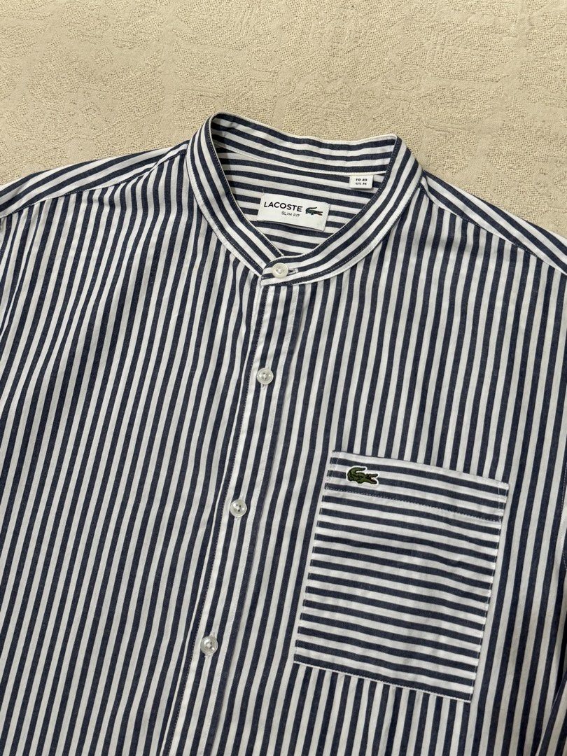Lacoste Chinese Collar Buttondown Longsleeves (Category: Formal Shirts) located in Angeles City. Submitted by luigisells (Listing ID 1466414446, Image 2). Description: Size M on tag fits L 29x20 Excellent Condition Issue/s: none MOP: Gcash or Bank Transfer Courier: J&t Express.