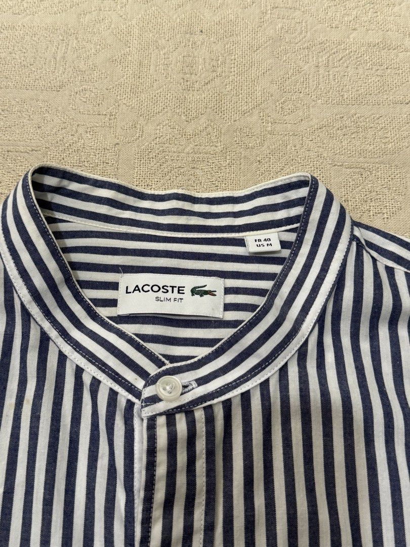 Lacoste Chinese Collar Buttondown Longsleeves (Category: Formal Shirts) located in Angeles City. Submitted by luigisells (Listing ID 1466414446, Image 3). Description: Size M on tag fits L 29x20 Excellent Condition Issue/s: none MOP: Gcash or Bank Transfer Courier: J&t Express.