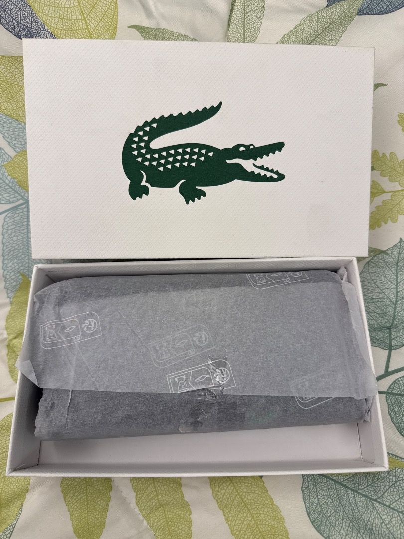 Lacoste Croc Logo White Textured Card (Category: Wallets & Card holders) located in Taytay. Submitted by jammam1226 (Listing ID 1466453542, Image 2). Description: - Item: Authentic Lacoste card stock - Design: White textured with central green crocodile logo - Condition: Used once/ almost new - Size: Standard rectangular - Perfect for: Gifting, packaging, or brand collecting.