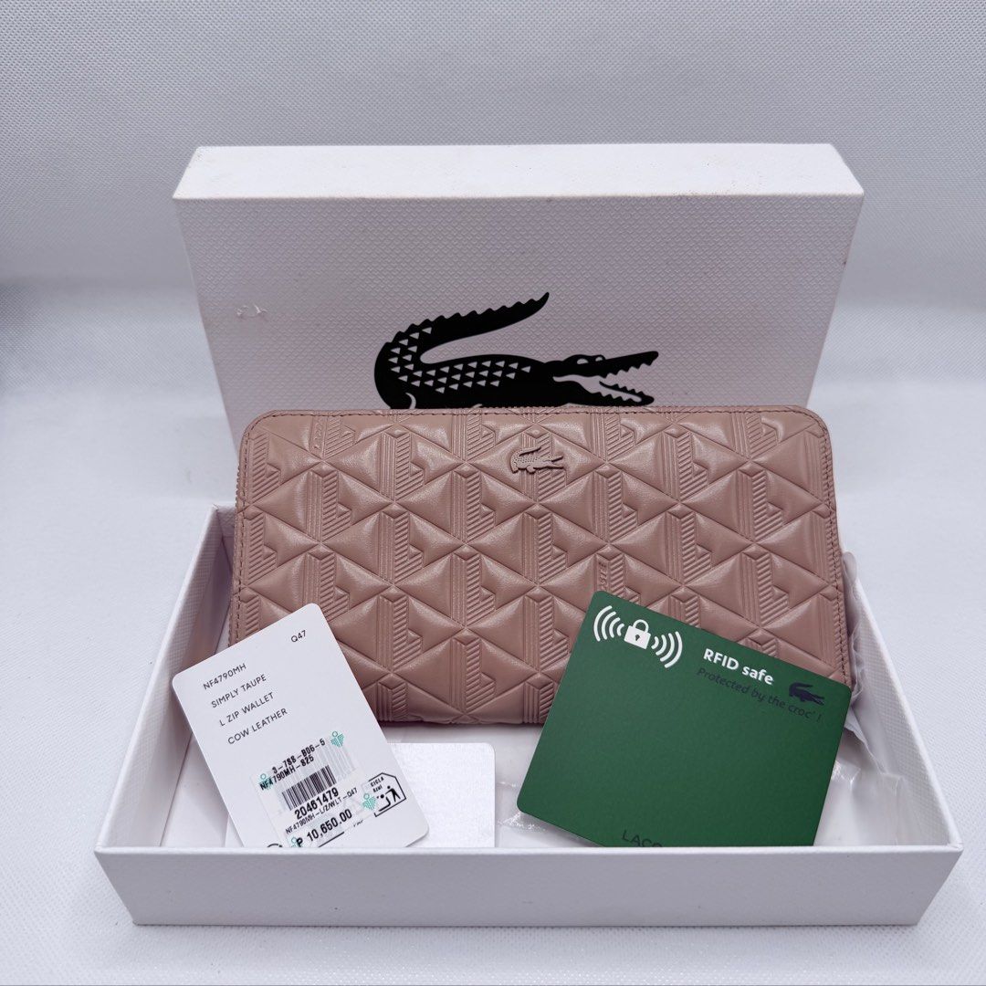 Lacoste Orig Long Wallet (Category: Wallets & Card holders) located in Quezon City. Submitted by ajandstevenshopscorner (Listing ID 1466423969, Image 2). Description: Fix price.