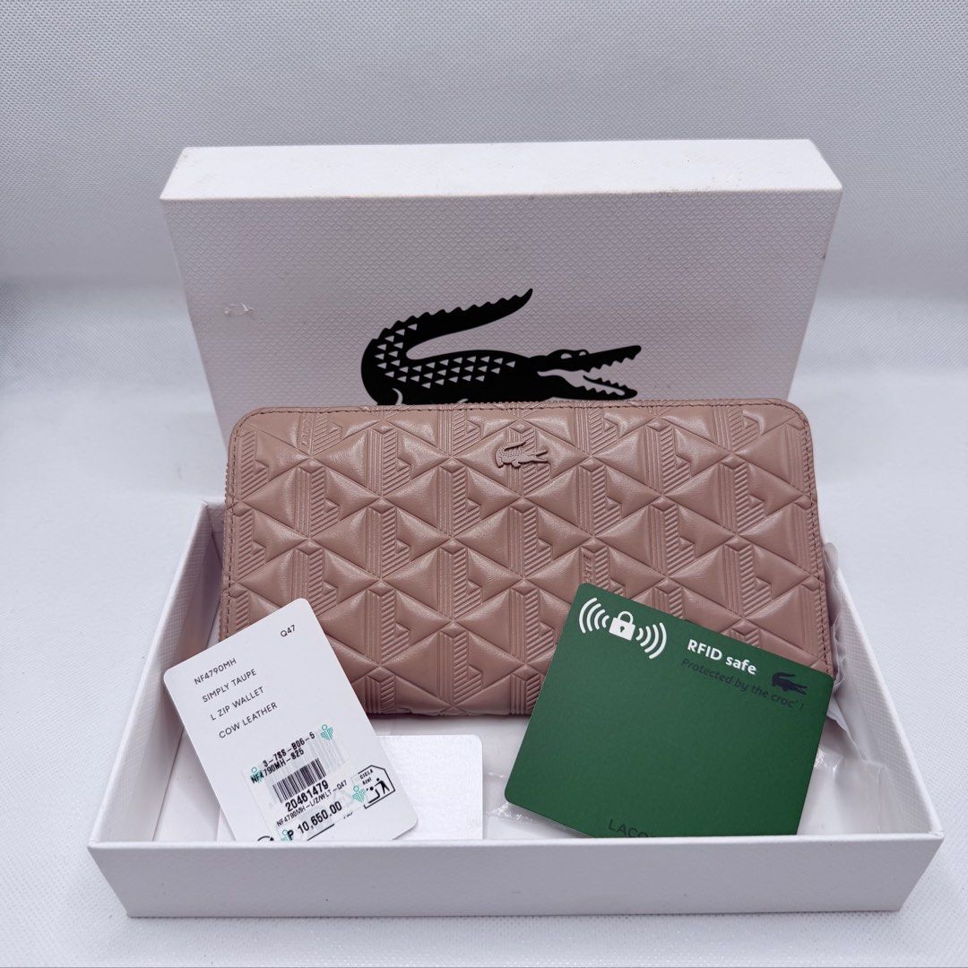 Lacoste Orig Long Wallet (Category: Wallets & Card holders) located in Quezon City. Submitted by ajandstevenshopscorner (Listing ID 1466423969, Image 1). Description: Fix price.