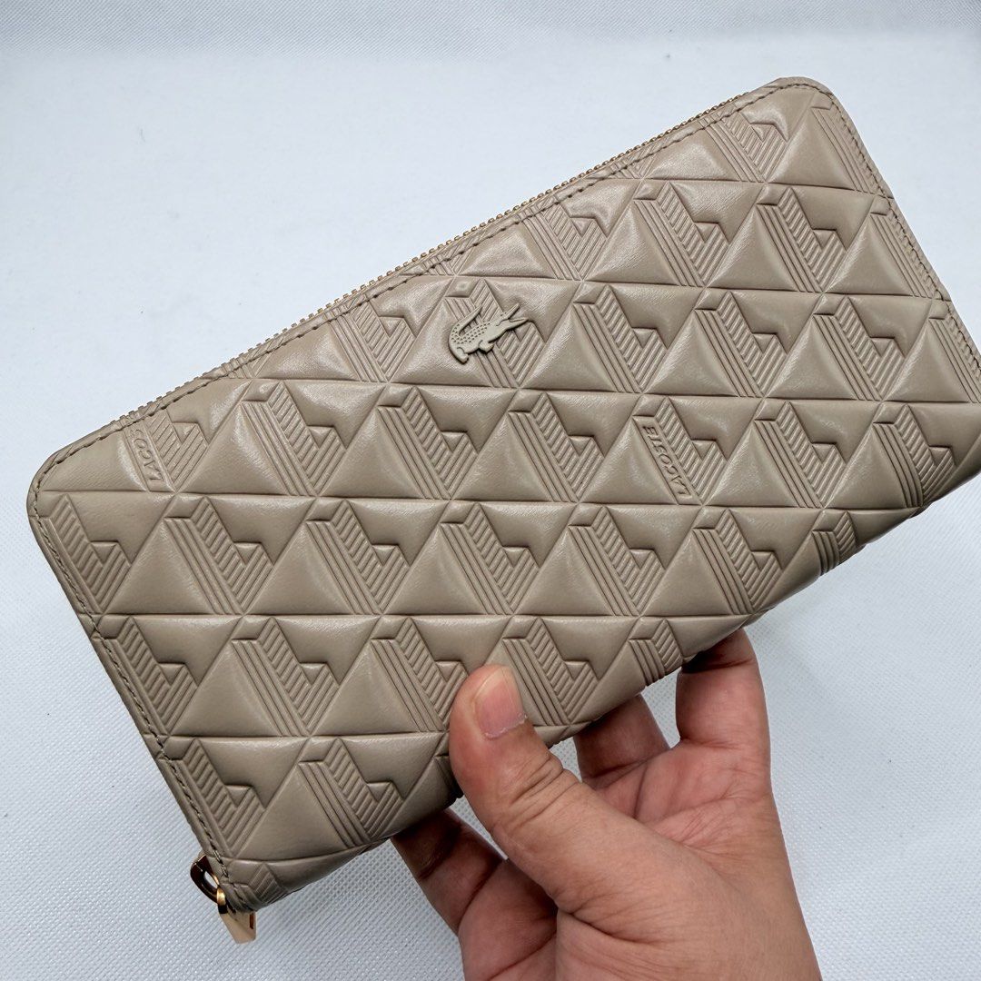 Lacoste Orig Long Wallet (Category: Wallets & Card holders) located in Quezon City. Submitted by ajandstevenshopscorner (Listing ID 1466423969, Image 3). Description: Fix price.