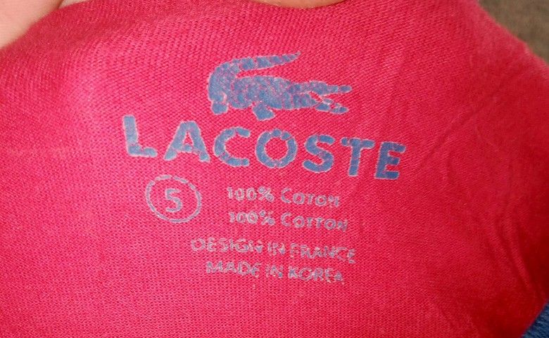 Lacoste Tee (Category: Activewear) located in Guihulngan. Submitted by johnjohndripgoods (Listing ID 1466367220, Image 2). Description: LACOSTE DIMES: 21x28 VERY GOOD CONDITION 9.5/10 COLOR RATE NEEDS WASH ISSUE: CRACK/HAIRLINES SA LOGO DM OPEN FOR VC.
