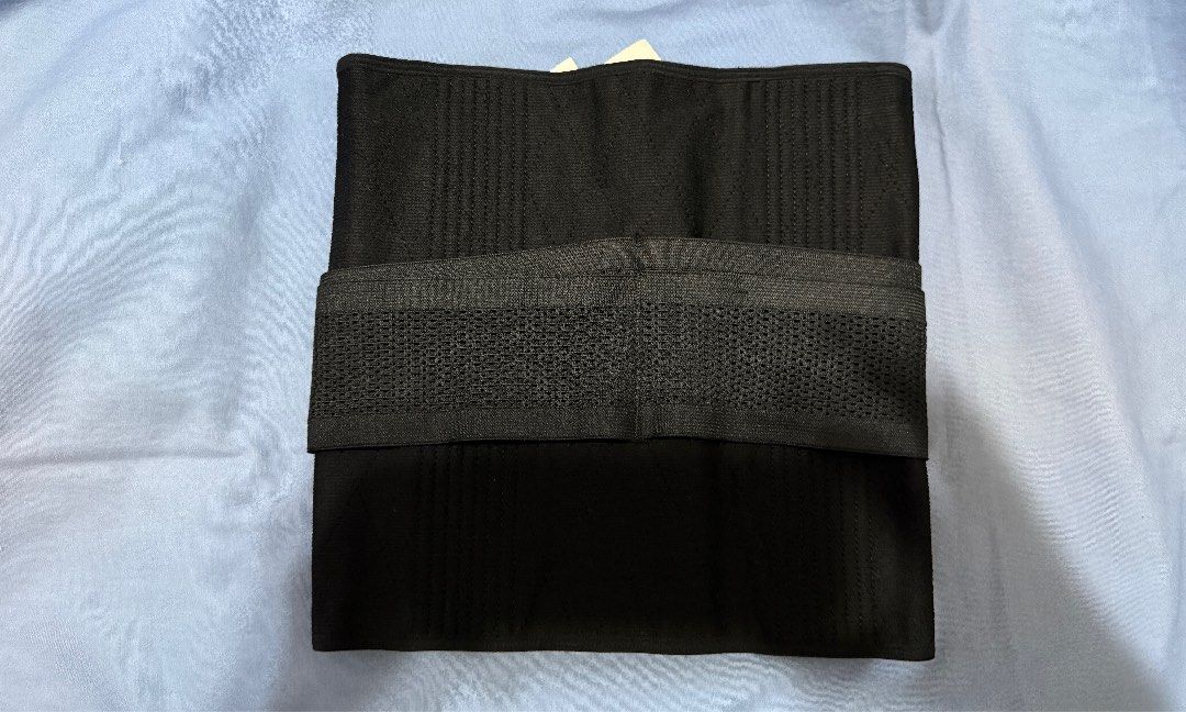 Lady Grace Intimates Black Waist Trainer (Category: Undergarments & Loungewear) located in Manila. Submitted by maria_mk (Listing ID 1466467228, Image 2). Description: Lady Grace Intimates waist trainer in solid black. Size XXXL. Hook and eye front closure with adjustable mesh side straps for extra support and compression. Original store tag still attached, showing price of 1,299.75. Never worn..