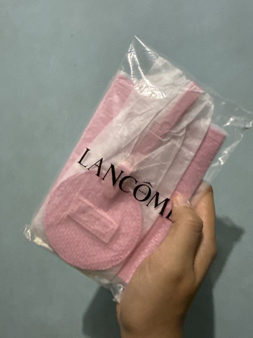 Lancôme Travel Set (Category: Tote Bags) located in Bulacan. Submitted by journeyingsisi (Listing ID 1466455718, Image 2). Description: - Brand: Lancôme - Item: Travel Tote Bag with Bag Charm and Passport Holder - Color/Pattern: Pink and white stripes - Material: Heavy canvas with sturdy white handles and bottom gussett - Condition: Brand new, unopened, with original tags and barcodes attached - Free Shipping.