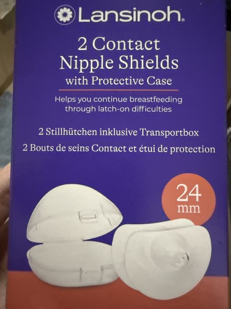 Lansinoh Contact Nipple Shields with Protective Case 24mm (Category: Breastfeeding & Bottle Feeding) located in Taguig. Submitted by alonsomom (Listing ID 1466439735, Image 1). Description: - Brand: Lansinoh - Size: 24mm - Condition: Brand new, unopened box (purple packaging) - Purpose: Helps continue breastfeeding through latch-on difficulties - Inclusions: 2 nipple shields and 1 protective transport case - RFS: Decluttering / Extra stock.