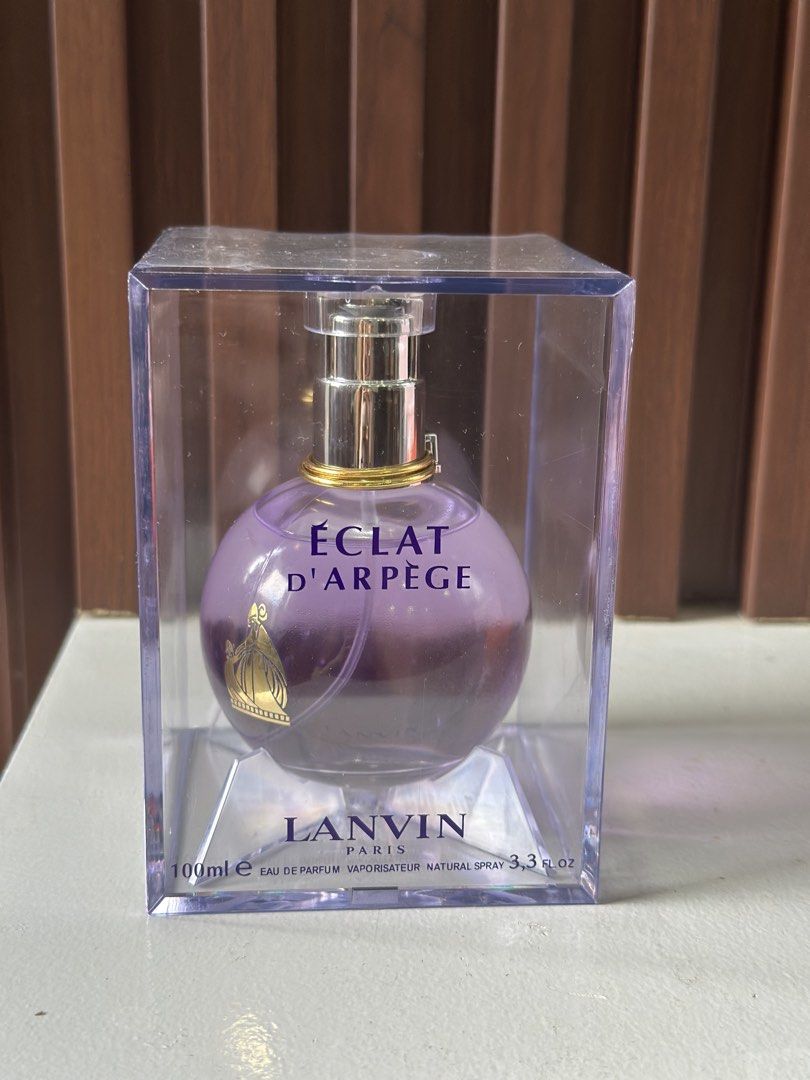 Lanvin Eclat D'Arpege Eau De Parfum 100ml (Category: Fragrance & Deodorants) located in Caloocan City. Submitted by brandeditemsph (Listing ID 1466390468, Image 1). Description: - Authentic Lanvin Eclat D'Arpege Eau de Parfum - Generous 100ml bottle size - Iconic purple round glass design with elegant gold accents and sprayer pump top - Classic, well-loved floral fruity fragrance profile - Includes original transparent plastic display presentatio