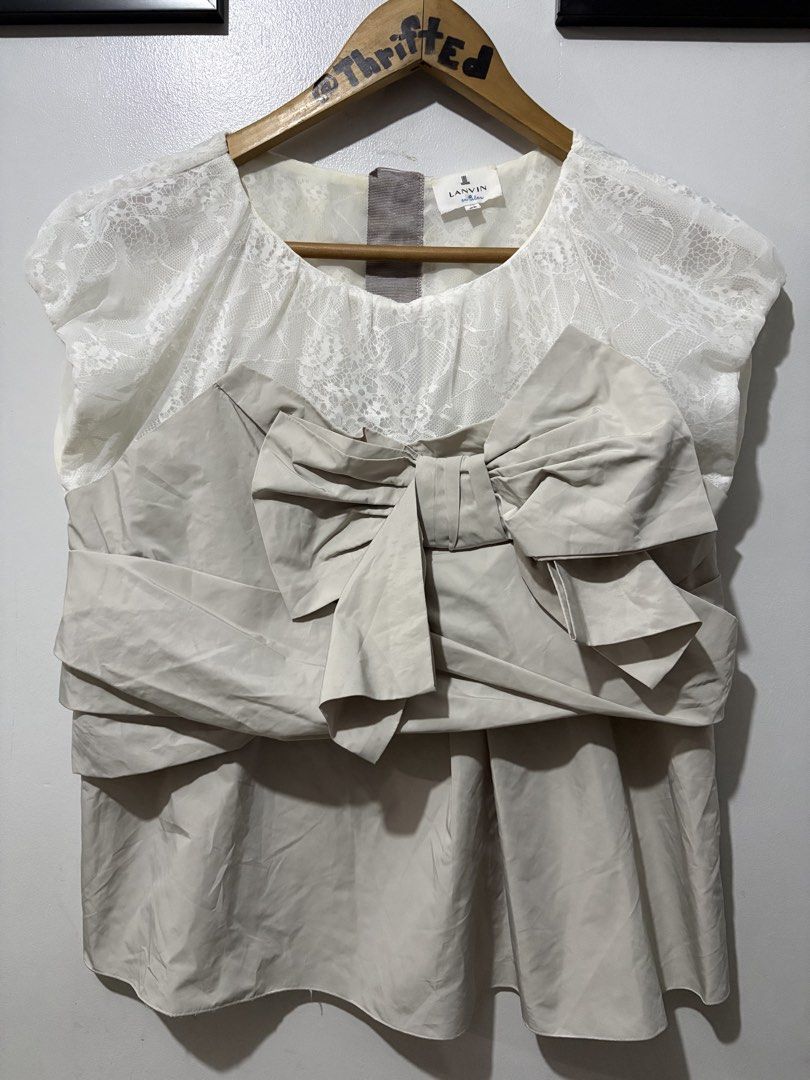 Lanvin Ribon Sleeveless Blouse (Category: Sleeveless) located in Makati City. Submitted by ThriftedGoods (Listing ID 1466403303, Image 2). Description: Feel free to ask for more detailed photos In excellent condition No issues Length-23 Width-19.