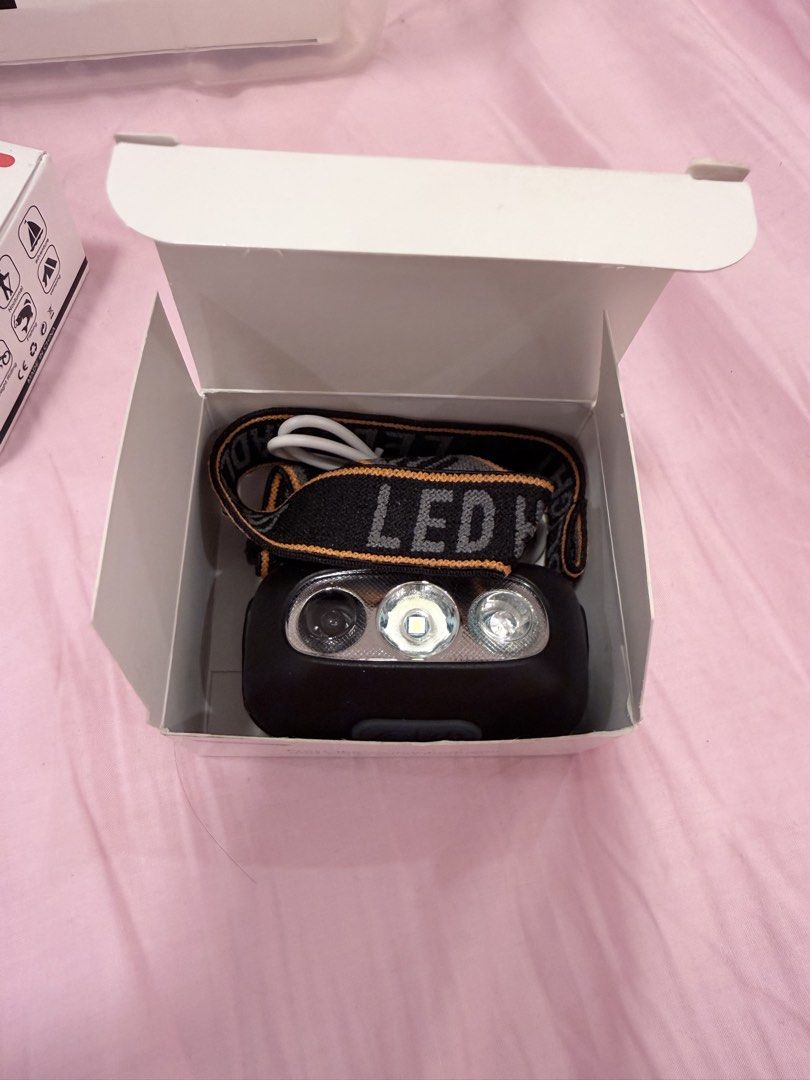 LED Headlight USB Rechargeable Motion Sensor Headlamp (Category: Hiking & Camping) located in Pasig City. Submitted by lagartode35575 (Listing ID 1466438250, Image 3). Description: - USB rechargeable LED headlight with long-lasting battery - Smart electric display to monitor battery level - Handy motion sensor for easy wave-to-turn-on/off control - Wide flood lighting and waterproof design for outdoor use - Includes charging cable and original bo
